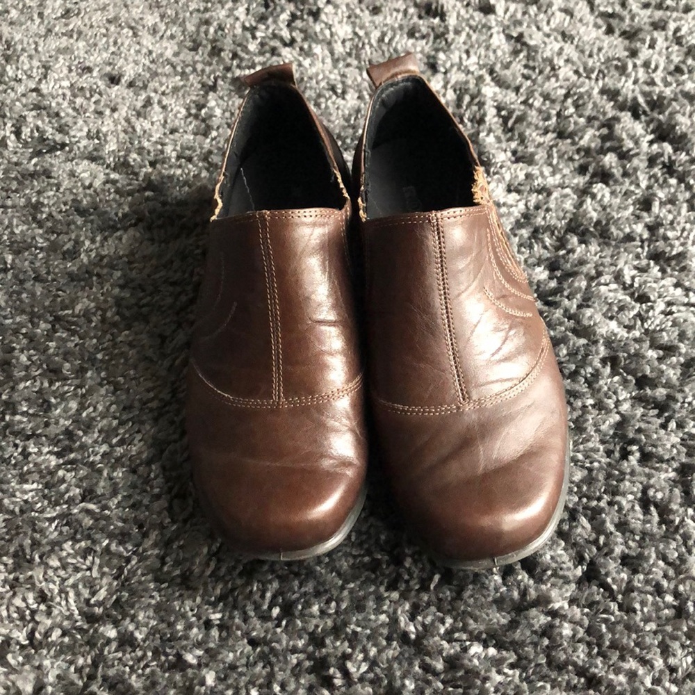 Chocolate brown Romika slip on shoes.